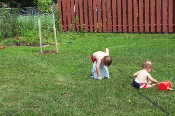 20050818 Andrew and Matthew playing with sprinkler 14